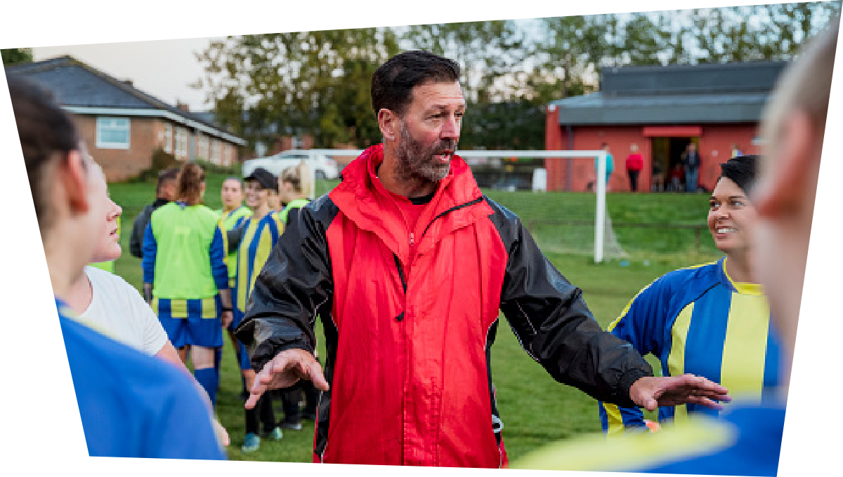 Coach talking to the team