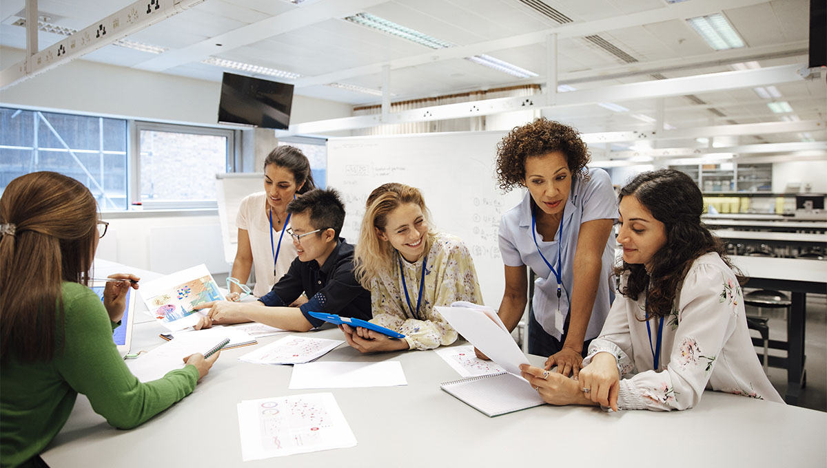 Teacher and students in a laboratory