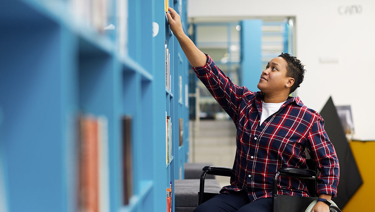 Student choosing books