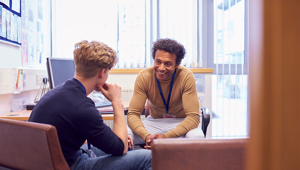 Student and counselor talking