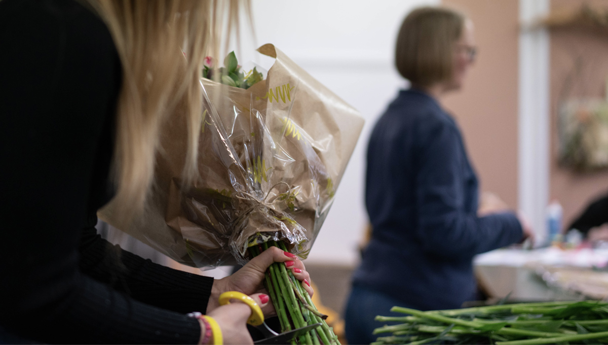 Person during a floristry class
